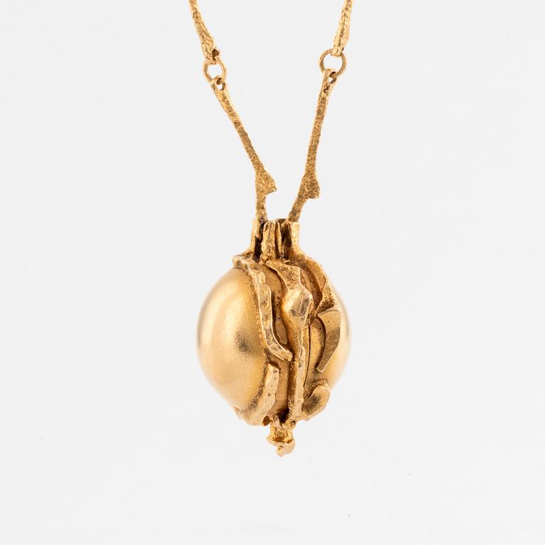 Björn Weckström, An 18K gold pendant/watch 18K gold, "Sun Dial".