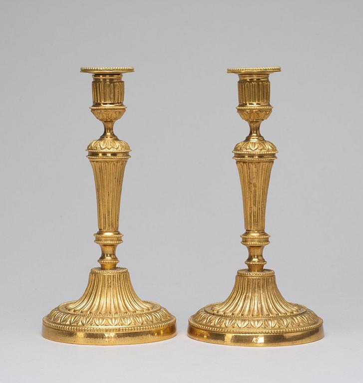 A pair of candlesticks, Louis XVI-style, circa 1900.