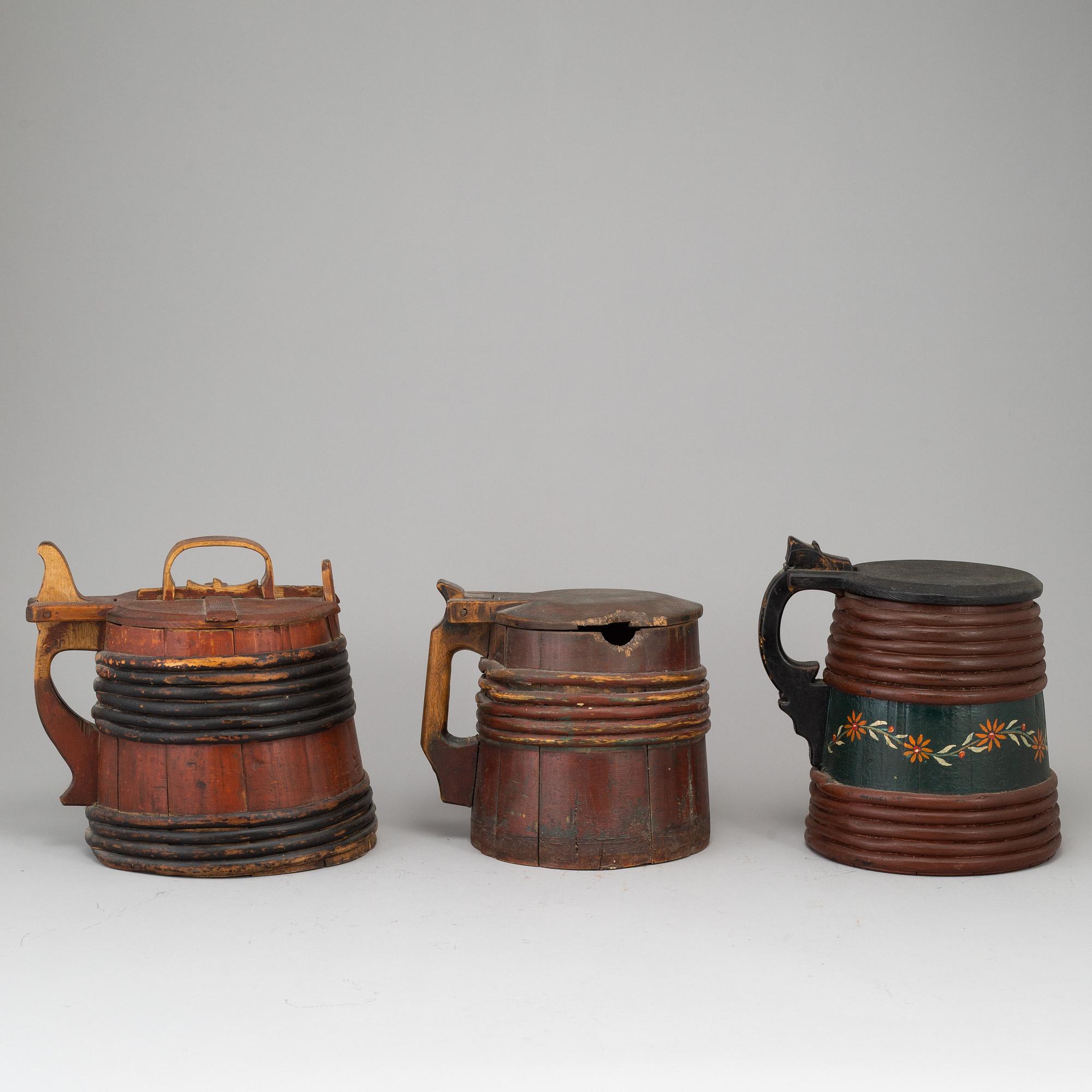 Three painted wooden jars from the 19-20th century.