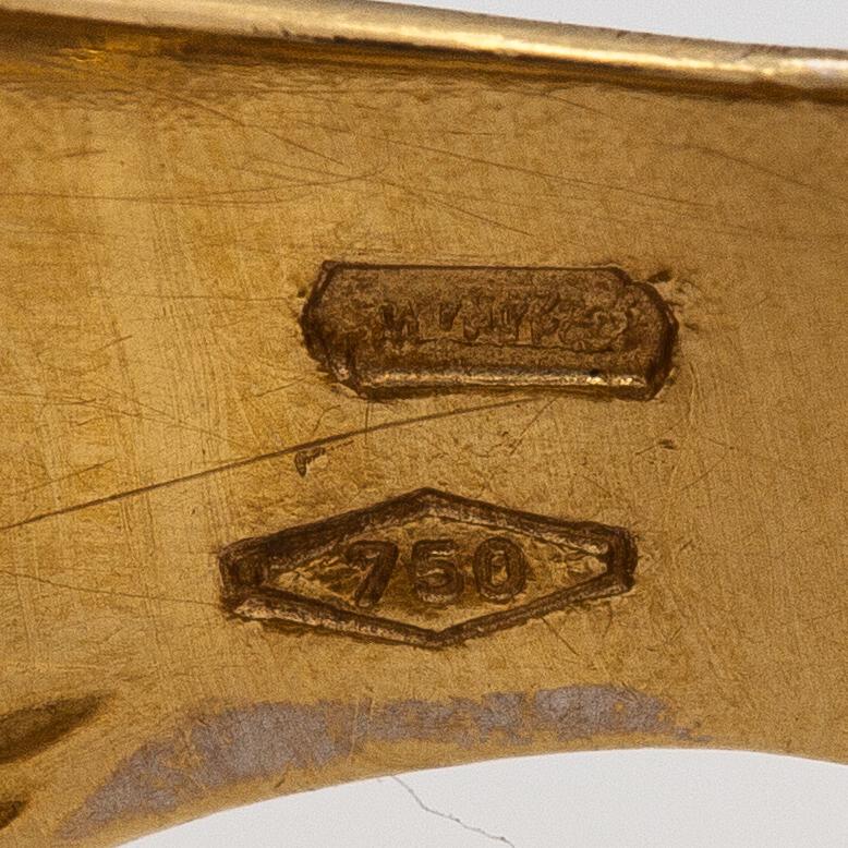 An 18K gold ring. Italy.