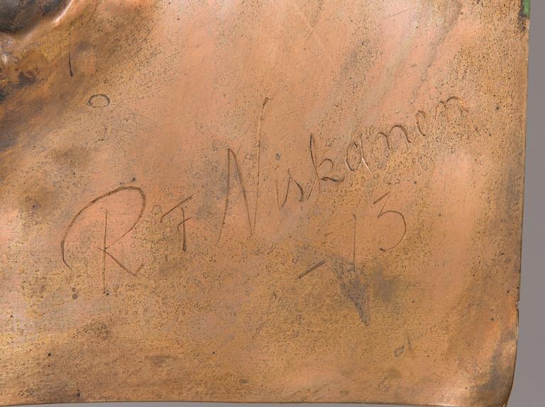 Reino Niskanen, a copper relief signed and dated -73.