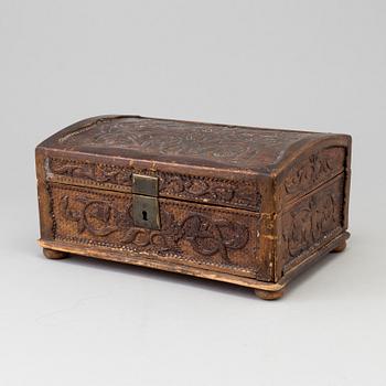 An 18th century wooden box.