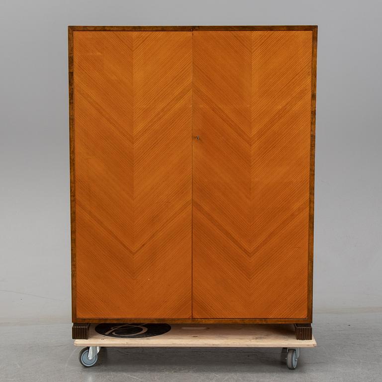 Axel Larsson, an elm and stained birch cabinet, AB Svenska Möbelfabrikerna, Bodafors, 1930/40-tal.