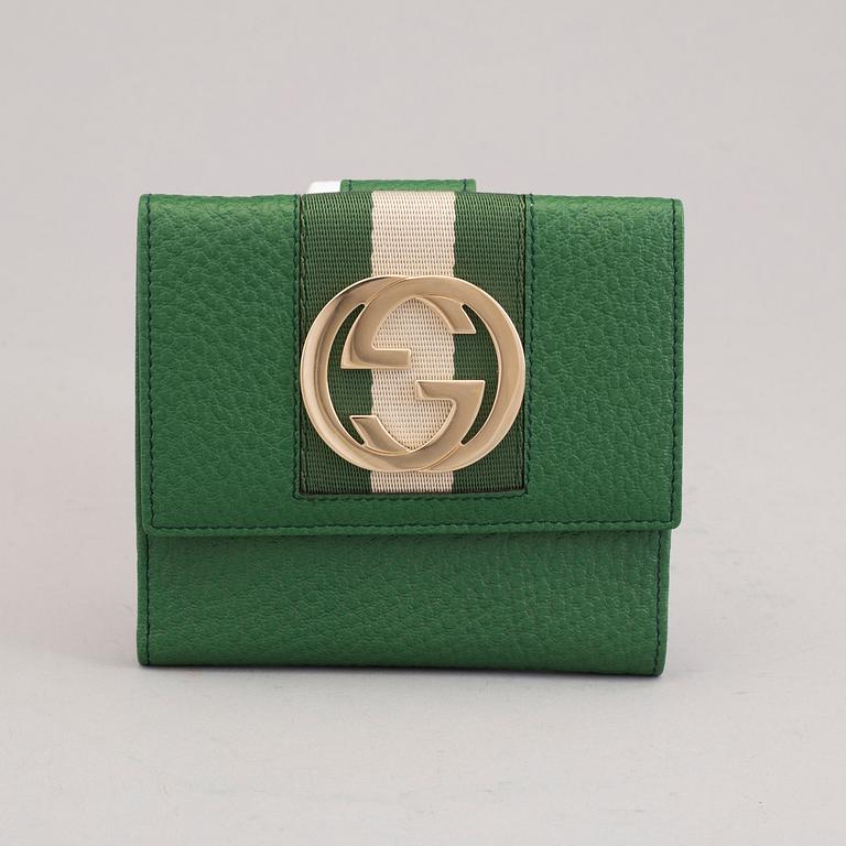 A wallet by Gucci.