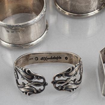 A collection of silver napkin rings, mostly England, Denmark (46 pieces).