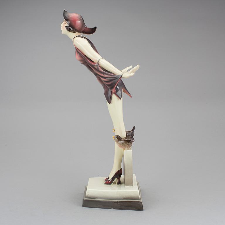 STEFAN DAKON, figurin, flintgods, Goldscheider, 1900-talets första hälft.