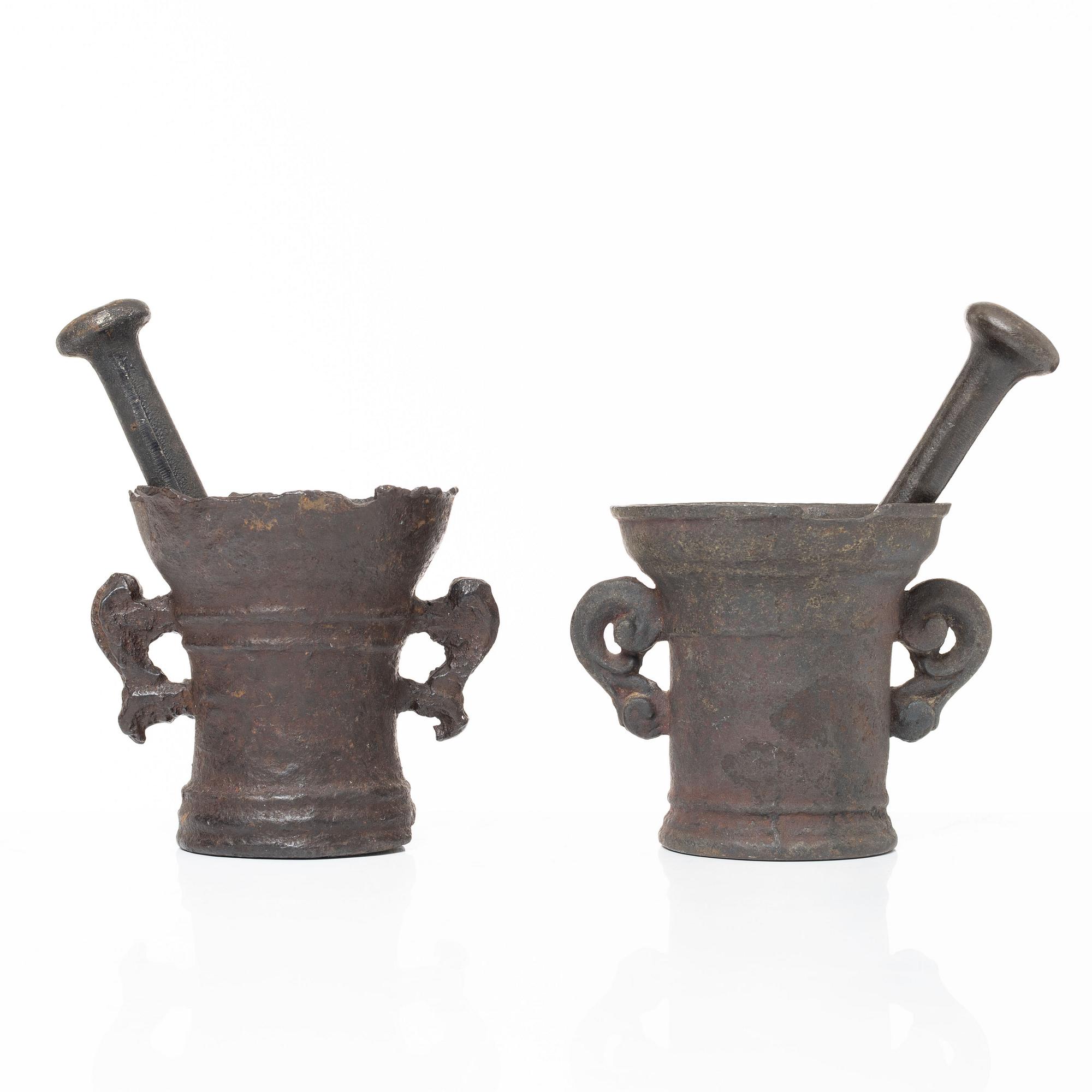 A set of two renaissance-type cast-iron mortars, 17th century.