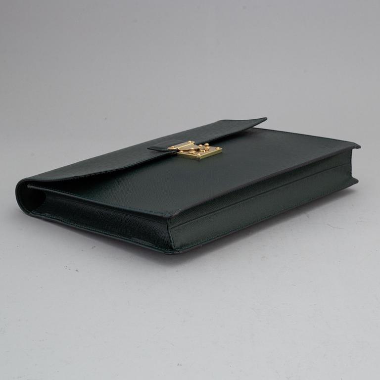 LOUIS VUITTON, a 'Taiga Serviette Kourad' briefcase.