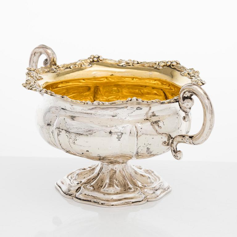 A silver sugar bowl, R. Mellin, Helsinki 1860, and two tea strainers, Kuopio and Porvoo, first half of the 19th century.