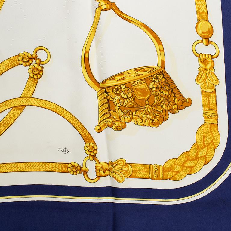 Hermès, a 'Gaucho par Hermès' silk scarf.