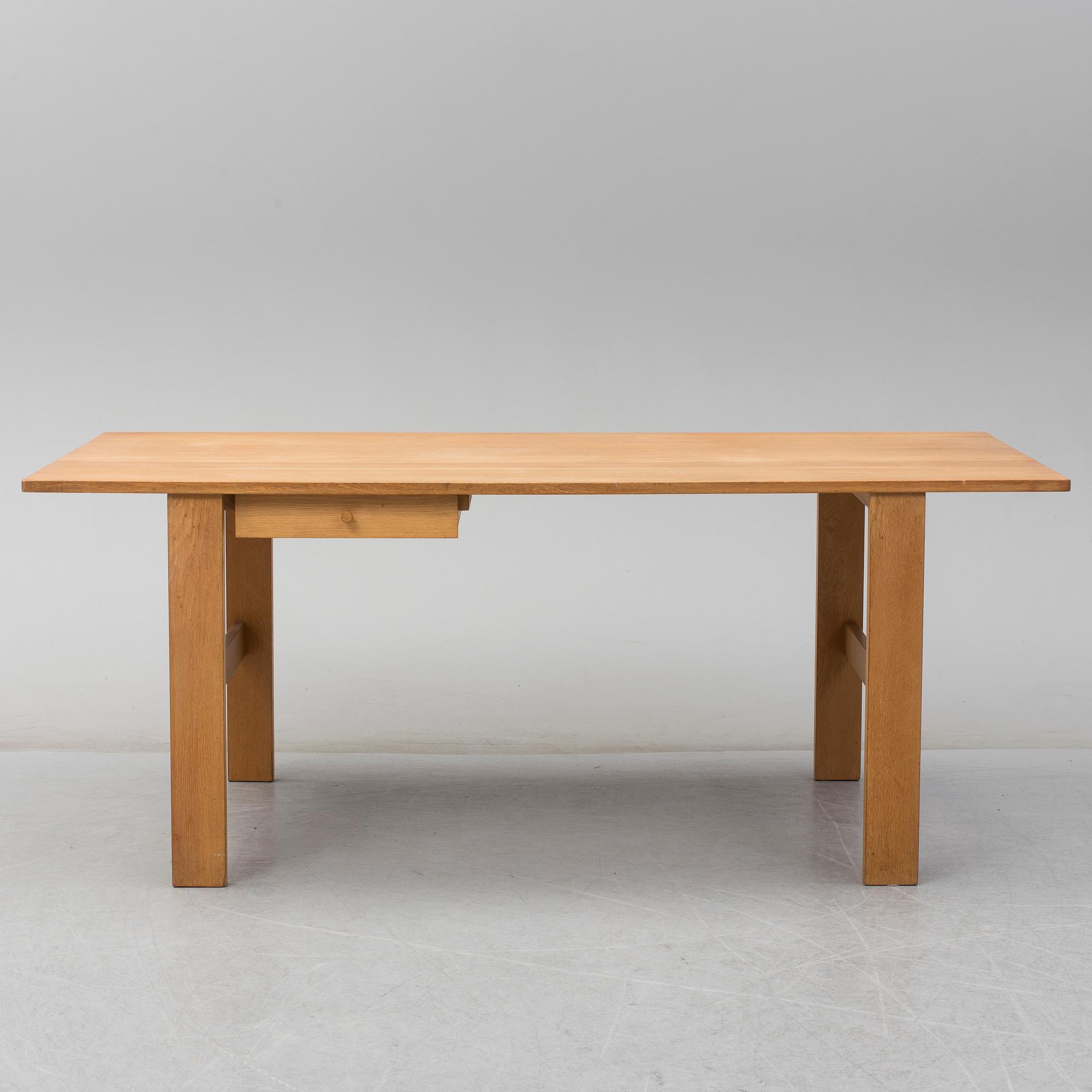 A second half of the 20th century oak table, 'Fogar', by John Kandell.