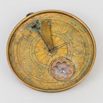 A 18th century bronze sundial.