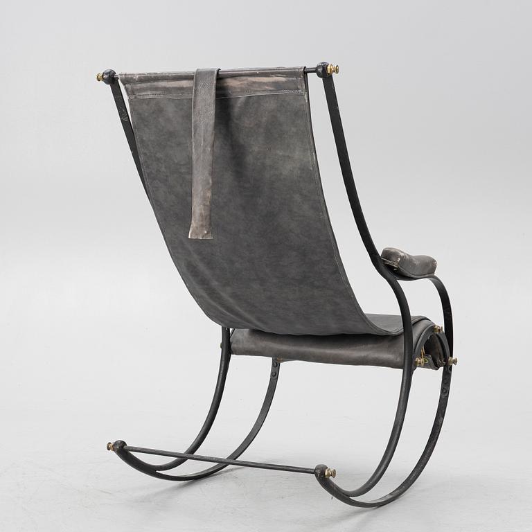 An iron rocking chair, R.W Winfeild & Company, England, late 19th century.