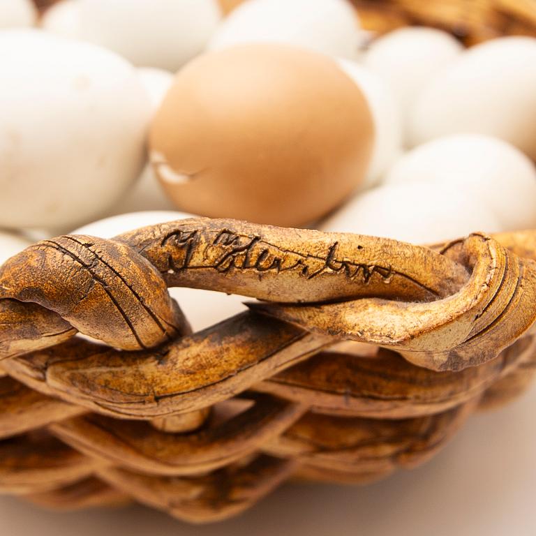 Ingrid Herrlin, basket with eggs, stoneware.