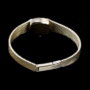 DAMARMBANDSUR, EBEL, 18k vitguld med 12 åttkantslipade diamanter. Vikt 29 g.