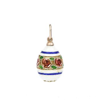 HÄNGE, emaljerat ägg med blomstermotiv. Silver samt 14K guld. Tot ca 7 gram.