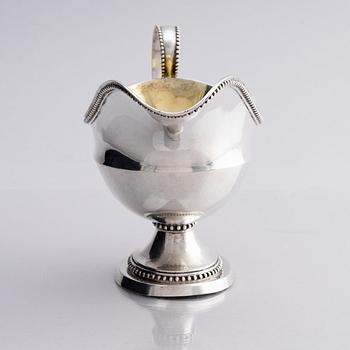 A Swedish 18th century parcel-gilt silver cream-jug, mark of Daniel Lundström, Stockholm 1787.