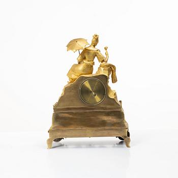 A Late Empire table clock, 19th century.