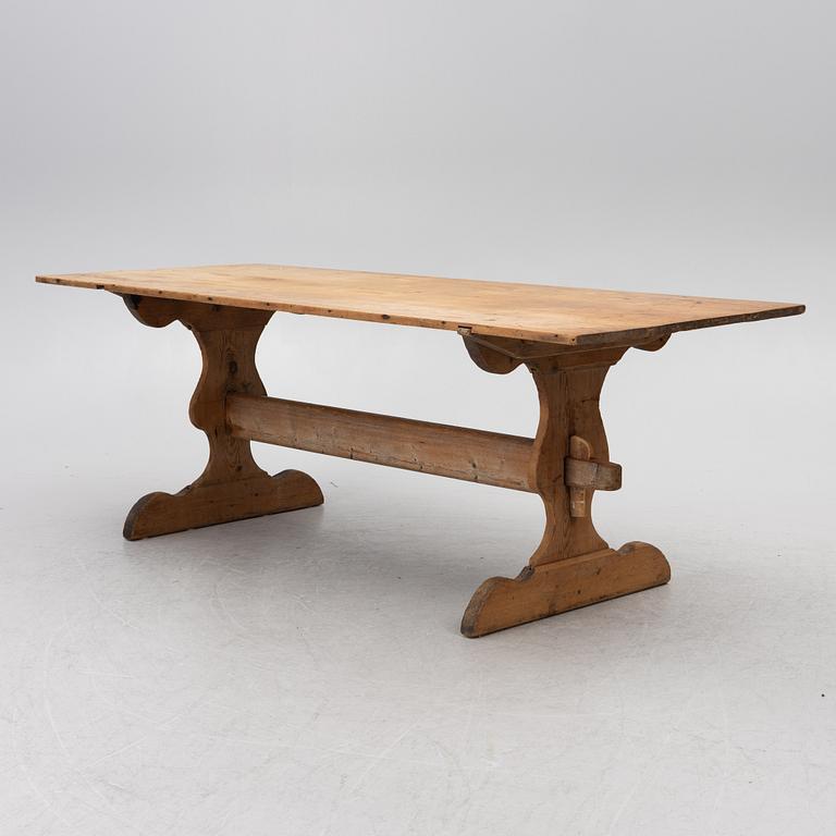 A Swedish pine trestle table, 18th / 19th century.