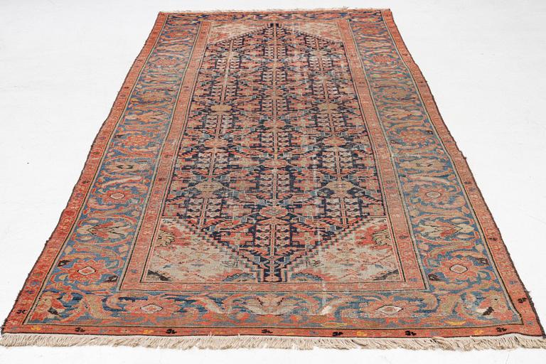 An antique Malayer carpet, west persia c 349 x 157 cm.