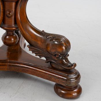 A empire-style side table from the late 19th century.