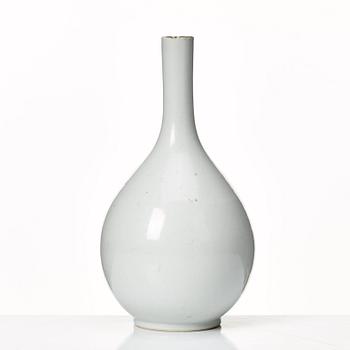 A white glazed anhua decorated vase, 18th Century, with Yongzheng four character mark.