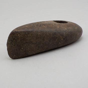 A late neolithic green stone axe.