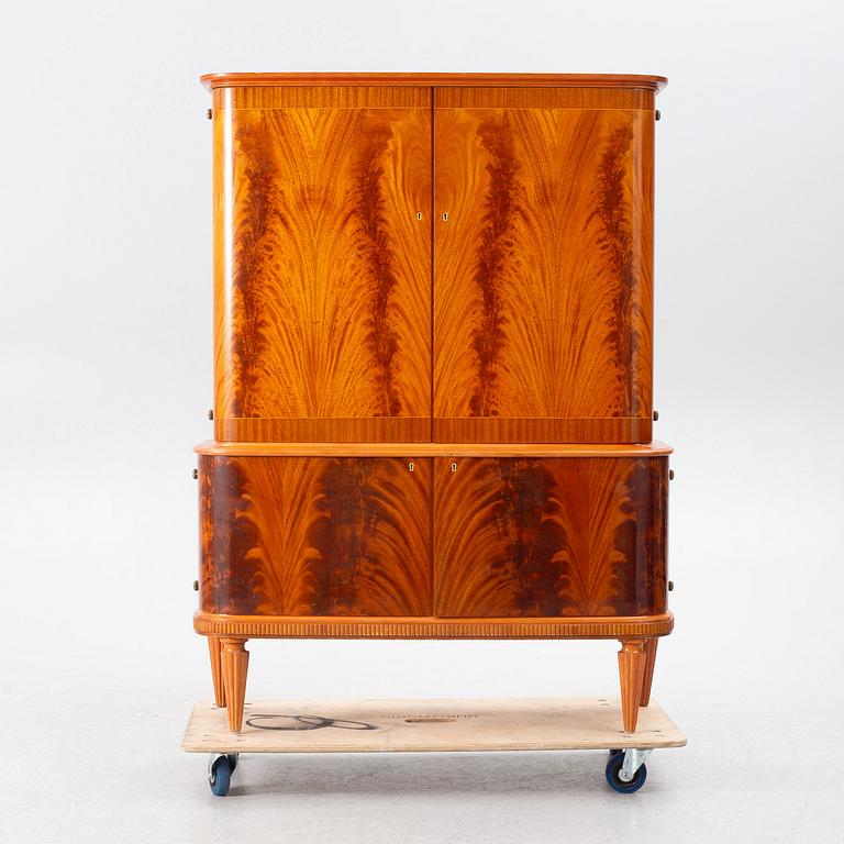 A Swedish Modern cabinet, mid 20th Century.