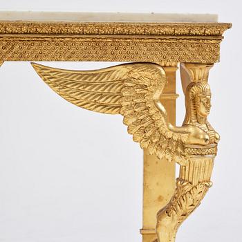 A late Gustavian giltwood console in the manner of J. Frisk, Stockholm, early 19th century.