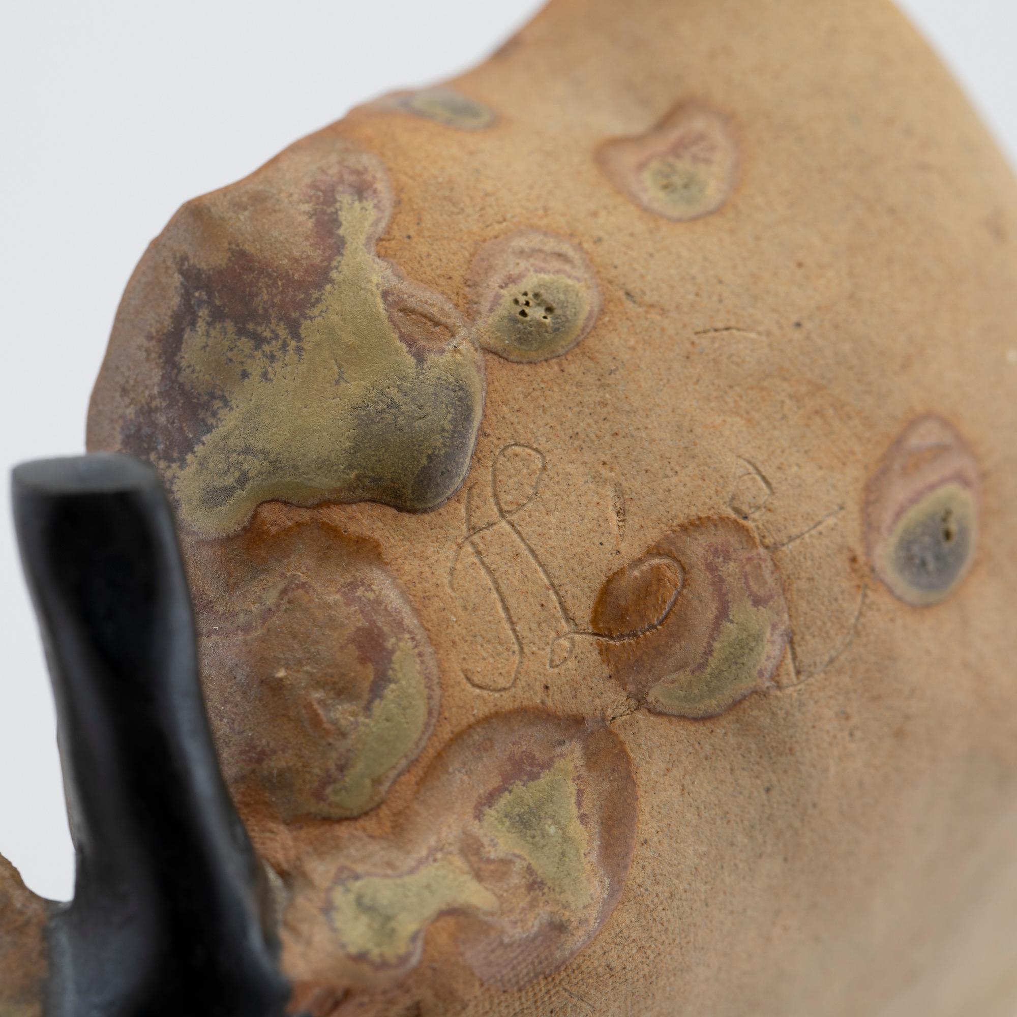 Tyra Lundgren, a partially glazed stoneware dish, Gustavsberg, mid 20th century.