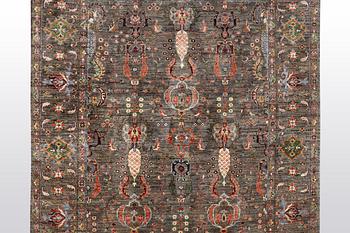 A rug, Zieglar design, ca 244 x 180 cm.