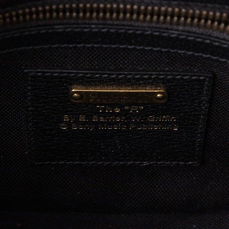 Gucci, midjeväska, "Music is mine".