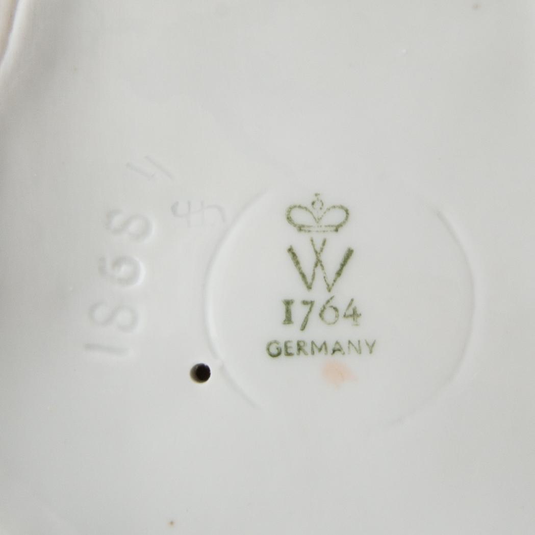 Figurines 4 pcs including Royal Dux and Wallendorf Germany mid-20th century porcelain.