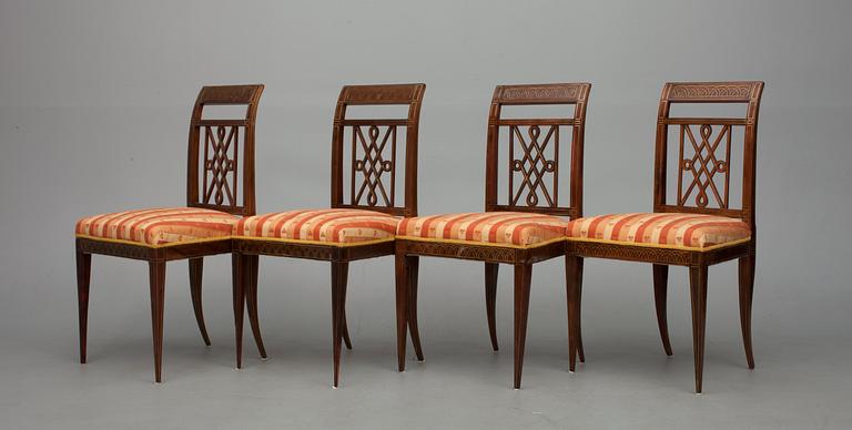 A SET OF FOUR CHAIRS.
