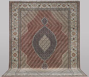 A carpet, Tabriz, part silk, 50 raj, ca 414 x 300 cm.