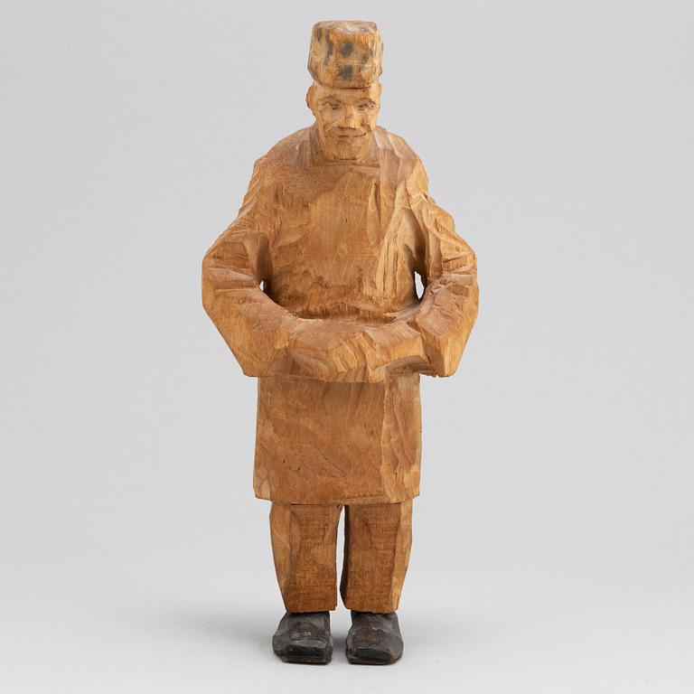 Axel Petersson Döderhultarn, sculpture. Signed. Carved and partly painted wood. Height 25.5 cm.