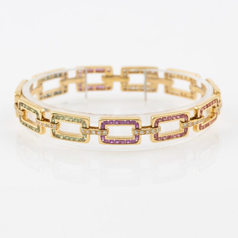 Bracelet 18K gold with sapphires in various colours and round brilliant-cut diamonds.