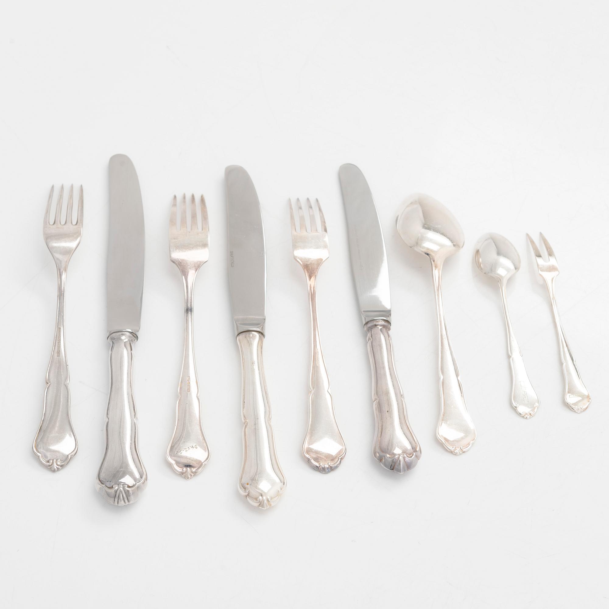 A 78-piece silver 'Chippendale' cutlery set, 1978-2007. Various Finnish manufacturers.
