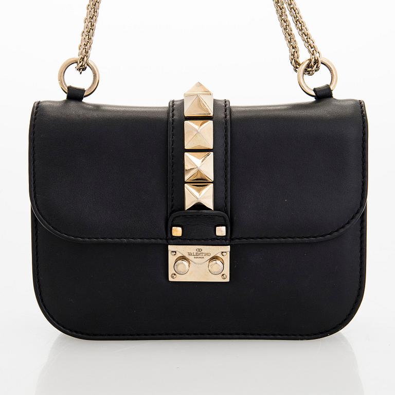 Valentino Garavani, a 'Glam Lock' bag.