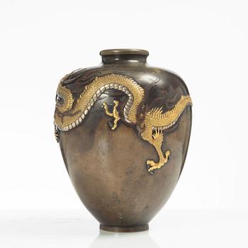 A Japanese gilt bronze and silvered dragon vase, Meiji period (1868-1912). Signed.