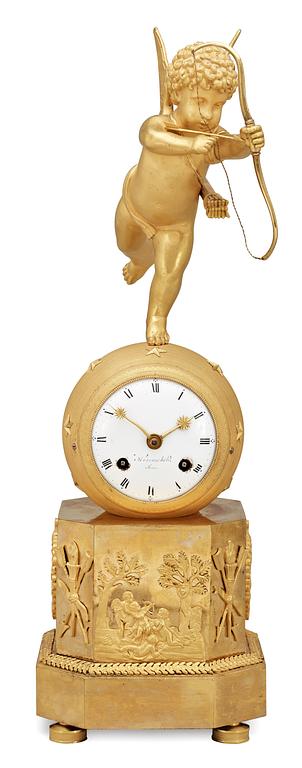 An Empire early 19th Century gilt bronze mantel clock.