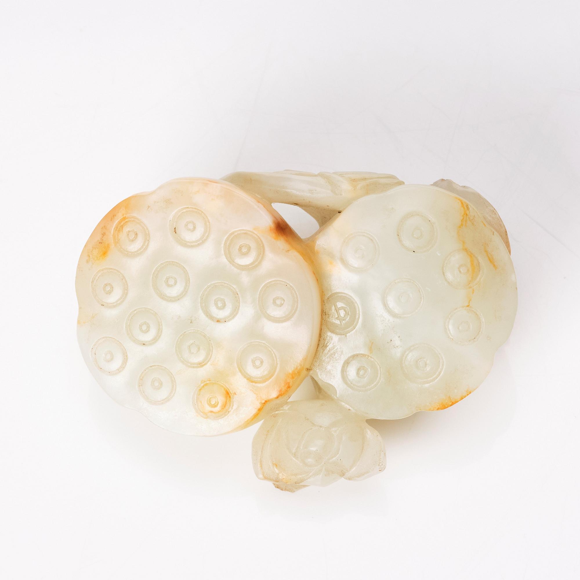 A nephrite sculpture of two lotusbuds, Qing dynasty.