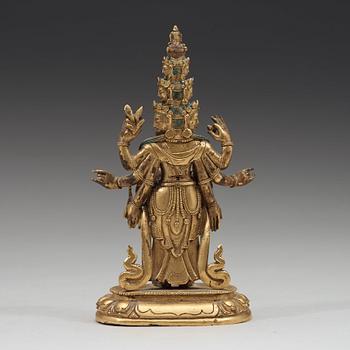 A standing figure of a 11-head Avalokiteshvara with eight arms, Tibet, circa 1800.