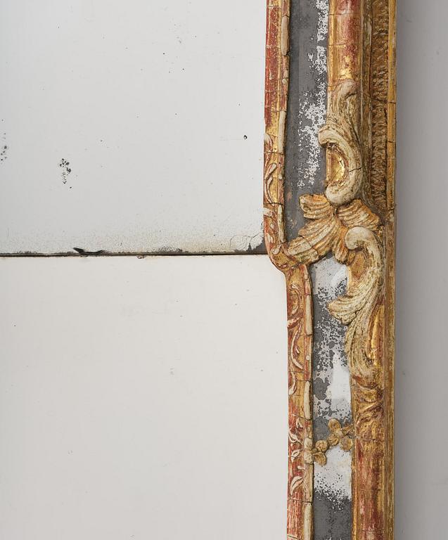 A Swedish gitlwood rococo mirror, Stockholm, later part 18th century.
