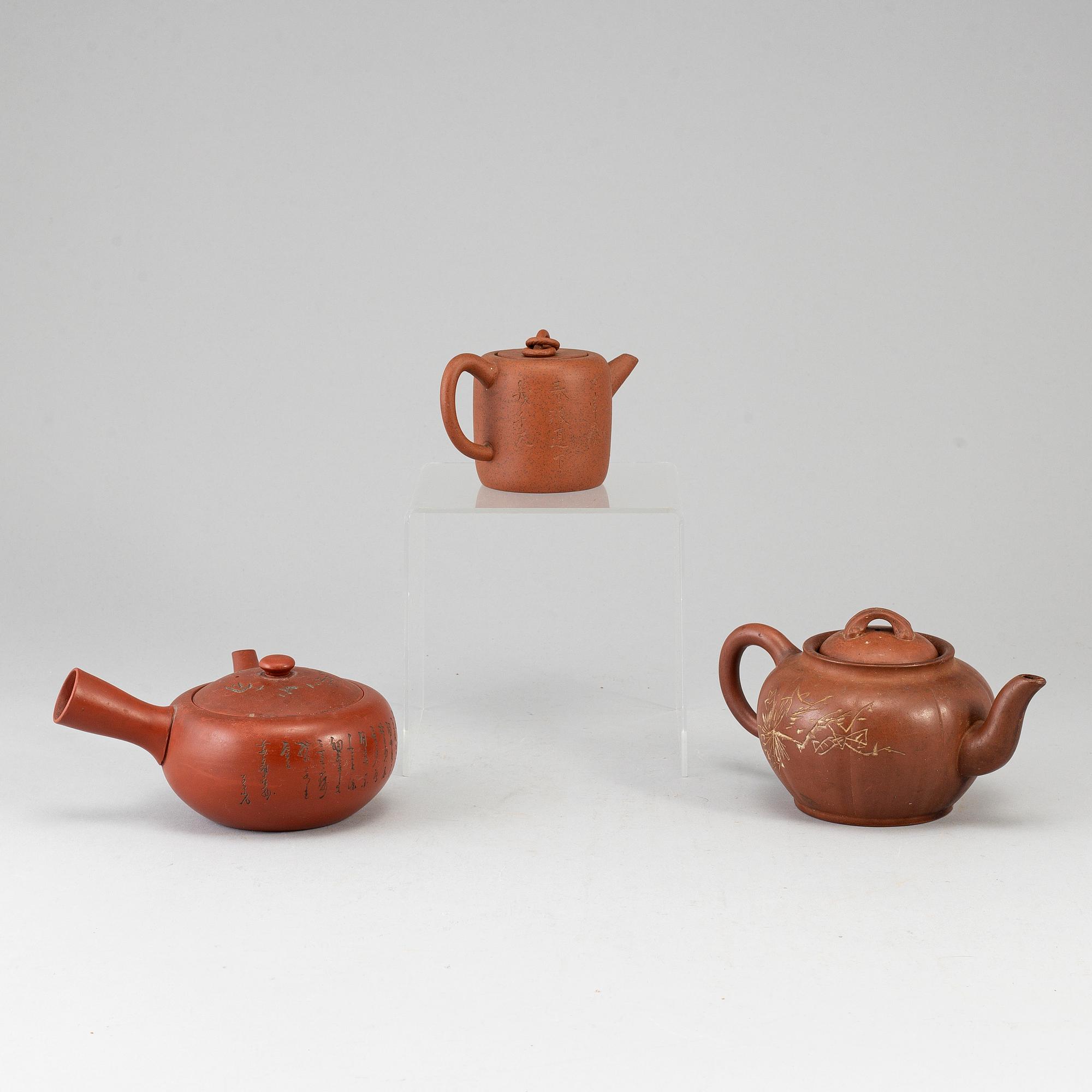 A group of three yixing pots, 20th century.