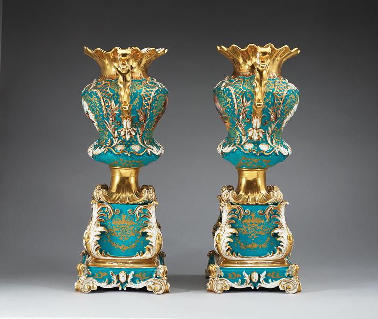 A pair of large french vases on stands, Jacob Petit, mid 19th Century.