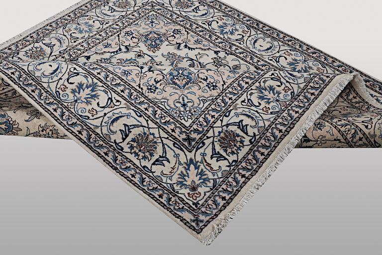 A rug, Nain, part silk, ca 200 x 195 cm.