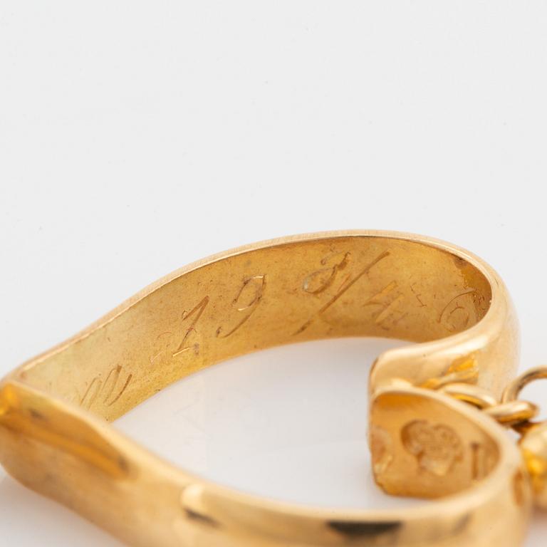 18K gold heart shaped earrings.
