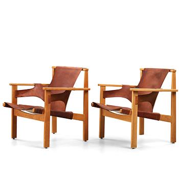 CARL-AXEL ACKING, a pair of 'Trienna' easy chairs, Källemo Sweden.
