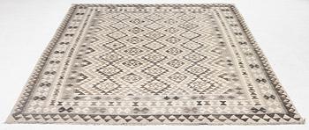 A Kelim carpet, a. 295 x 200 cm.